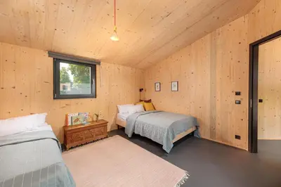 Ein Bett oder Betten in einem Zimmer der Unterkunft Ferienhaus direkt am See Uckermark
