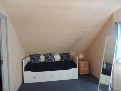 Ein Bett oder Betten in einem Zimmer der Unterkunft Feriendorf Klosterheide
