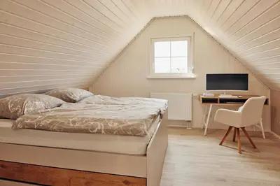 Ein Bett oder Betten in einem Zimmer der Unterkunft Schorfheide - Ferienhaus mit Sauna und Hot Tub Whirlpool! Energiekosten flat