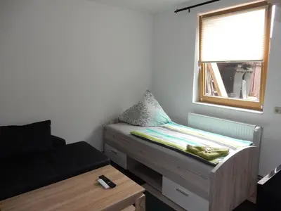 Ein Bett oder Betten in einem Zimmer der Unterkunft Feriengäste und Monteure in der Nähe von Berlin