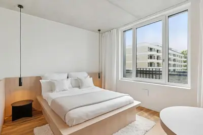 Ein Bett oder Betten in einem Zimmer der Unterkunft Habyt-The Waterfront