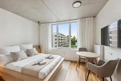 Ein Bett oder Betten in einem Zimmer der Unterkunft Habyt-The Waterfront