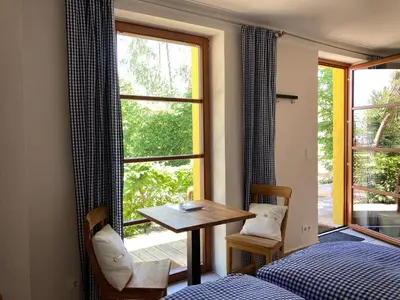 Ein Bett oder Betten in einem Zimmer der Unterkunft Teichland Linum Apartments