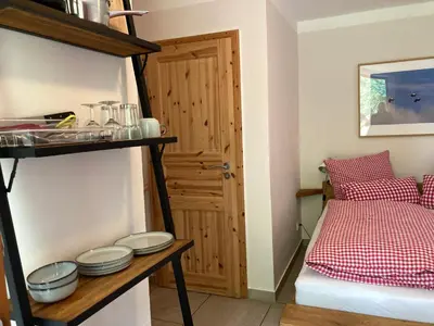 Ein Bett oder Betten in einem Zimmer der Unterkunft Teichland Linum Apartments