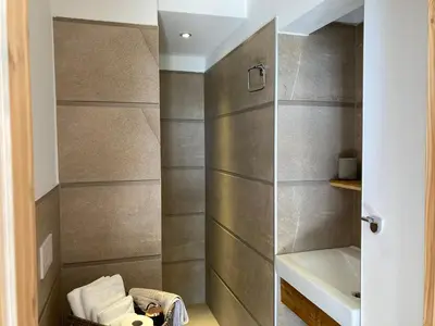 Ein Badezimmer in der Unterkunft Teichland Linum Apartments