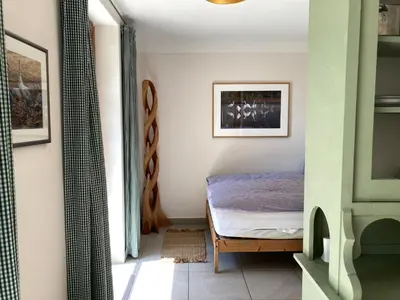 Ein Bett oder Betten in einem Zimmer der Unterkunft Teichland Linum Apartments