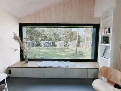 Ein Sitzbereich in der Unterkunft Haus 1 - ELF AM SEE