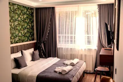 Ein Bett oder Betten in einem Zimmer der Unterkunft Hotel Yaman