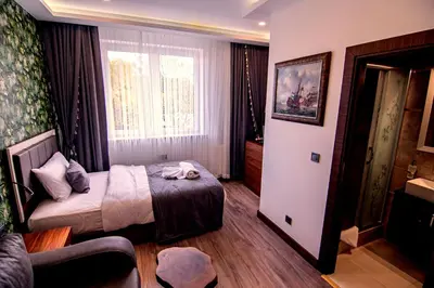 Ein Bett oder Betten in einem Zimmer der Unterkunft Hotel Yaman
