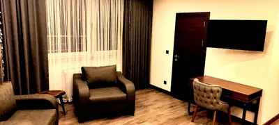 Ein Sitzbereich in der Unterkunft Hotel Yaman