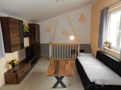 Ein Bett oder Betten in einem Zimmer der Unterkunft Apartment Haus 25