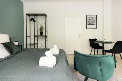 Ein Bett oder Betten in einem Zimmer der Unterkunft Central Design Apartments at Ku´Damm