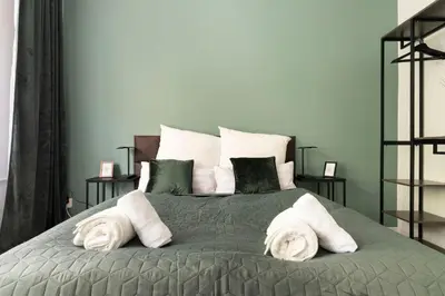 Ein Bett oder Betten in einem Zimmer der Unterkunft Central Design Apartments at Ku´Damm