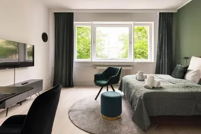 Ein Bett oder Betten in einem Zimmer der Unterkunft Central Design Apartments at Ku´Damm
