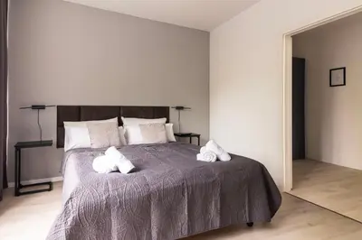 Ein Bett oder Betten in einem Zimmer der Unterkunft Central Design Apartments at Ku´Damm
