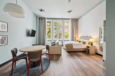 Ein Bett oder Betten in einem Zimmer der Unterkunft Limehome Berlin Stresemannstr
