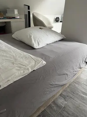 Ein Bett oder Betten in einem Zimmer der Unterkunft Hakuna Matata - 2 Schlafzimmer - 3 Zimmer - Netflix - S-Bahn - Parkplatz - kinderfreundlich - Immanuel Helios Klinikum