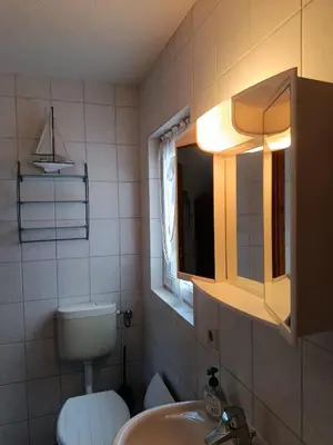 Ein Badezimmer in der Unterkunft ferienhaus-am-scharmützelsee