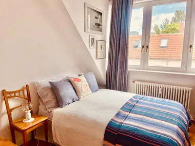 Ein Bett oder Betten in einem Zimmer der Unterkunft Privatzimmer mit Dachterasse in Berlin Mitte