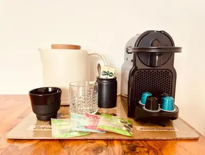 Kaffee-/Teezubehör in der Unterkunft Privatzimmer mit Dachterasse in Berlin Mitte