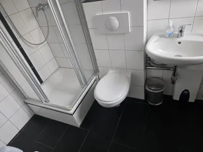 Ein Badezimmer in der Unterkunft Pension am Filmpark