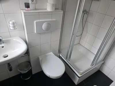 Ein Badezimmer in der Unterkunft Pension am Filmpark