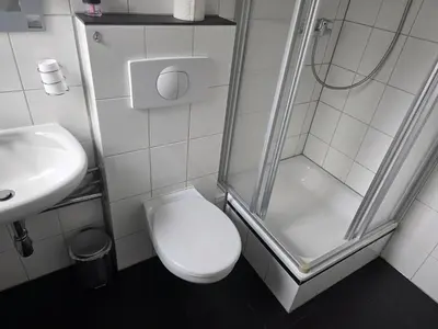 Ein Badezimmer in der Unterkunft Pension am Filmpark