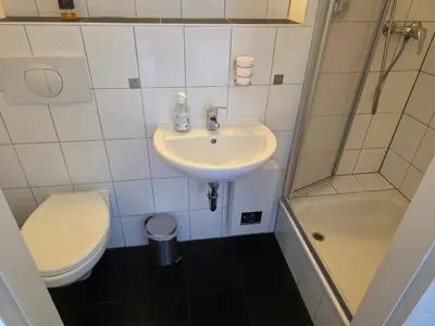 Ein Badezimmer in der Unterkunft Pension am Filmpark