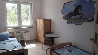 Ein Bett oder Betten in einem Zimmer der Unterkunft FeWo NAHE Berlin für bis zu 8 Monteure