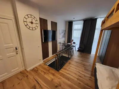 Ein Bett oder Betten in einem Zimmer der Unterkunft Kant 99 S