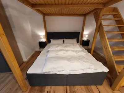 Ein Bett oder Betten in einem Zimmer der Unterkunft Kant 99 S