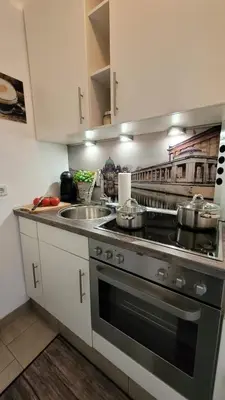 Küche/Küchenzeile in der Unterkunft Berlin-Oase - schnuckelige Ferienwohnung an der Grenze zu Berlin