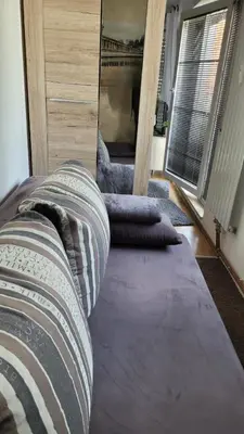 Ein Bett oder Betten in einem Zimmer der Unterkunft Berlin-Oase - schnuckelige Ferienwohnung an der Grenze zu Berlin