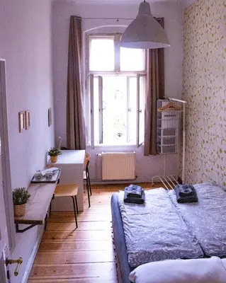Ein Bett oder Betten in einem Zimmer der Unterkunft Private 10sqm Room in Shared Flat near Schönhauser Allee