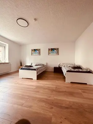 Ein Bett oder Betten in einem Zimmer der Unterkunft Villa 12