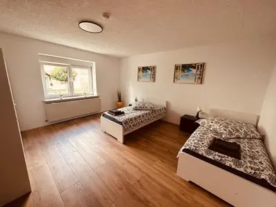 Ein Bett oder Betten in einem Zimmer der Unterkunft Villa 12