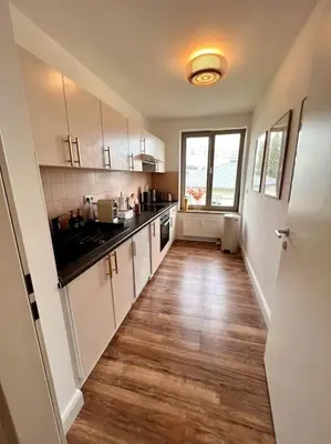 Küche/Küchenzeile in der Unterkunft BALI HOME Stylische Wohnung mit Terrasse