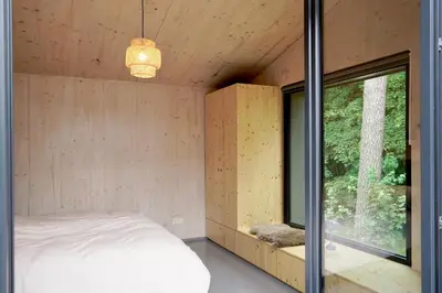 Ein Bett oder Betten in einem Zimmer der Unterkunft Elf am See - Haus 7