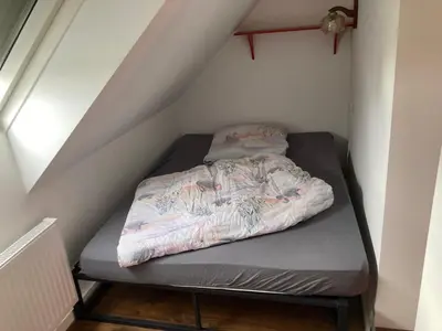 Ein Bett oder Betten in einem Zimmer der Unterkunft Alter Rhin
