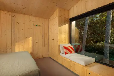 Ein Bett oder Betten in einem Zimmer der Unterkunft Elf am See - Haus 10