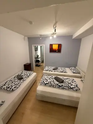 Ein Bett oder Betten in einem Zimmer der Unterkunft Ferienwohnung Kreuzberg
