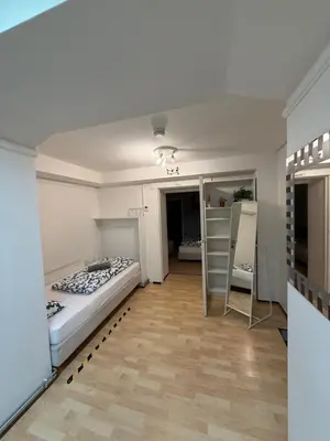 Ein Bett oder Betten in einem Zimmer der Unterkunft Ferienwohnung Kreuzberg