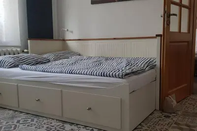 Ein Bett oder Betten in einem Zimmer der Unterkunft Ferienwohnung Zur Rose
