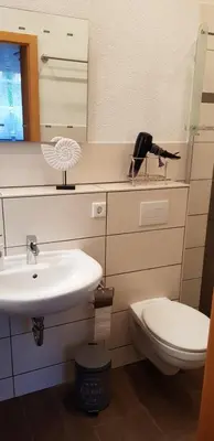 Ein Badezimmer in der Unterkunft Ferienwohnung Zur Rose