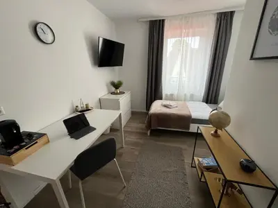 TV/Unterhaltungsangebot in der Unterkunft OMNI Rooms - Oranienburg