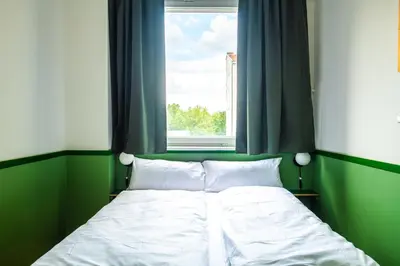 Ein Bett oder Betten in einem Zimmer der Unterkunft Flattering - Berlin