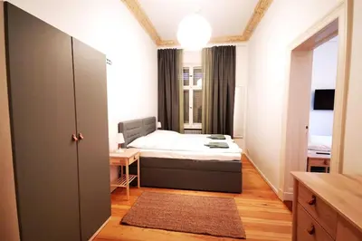 Ein Bett oder Betten in einem Zimmer der Unterkunft LANG Li by ROCKCHAIR Apartments l SUPERHOST Status l 2 Bedrooms Boxspringbeds in City Center - Cozy Family & Business Flair welcomes you!