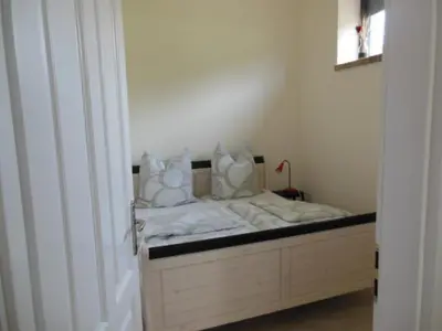 Ein Bett oder Betten in einem Zimmer der Unterkunft Schöne Scheune Lünow