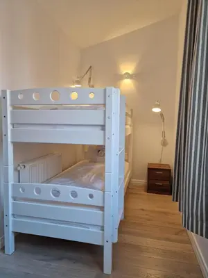 Ein Bett oder Betten in einem Zimmer der Unterkunft Sonnenhaus