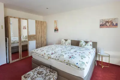 Ein Bett oder Betten in einem Zimmer der Unterkunft Ferienhaus Annerose